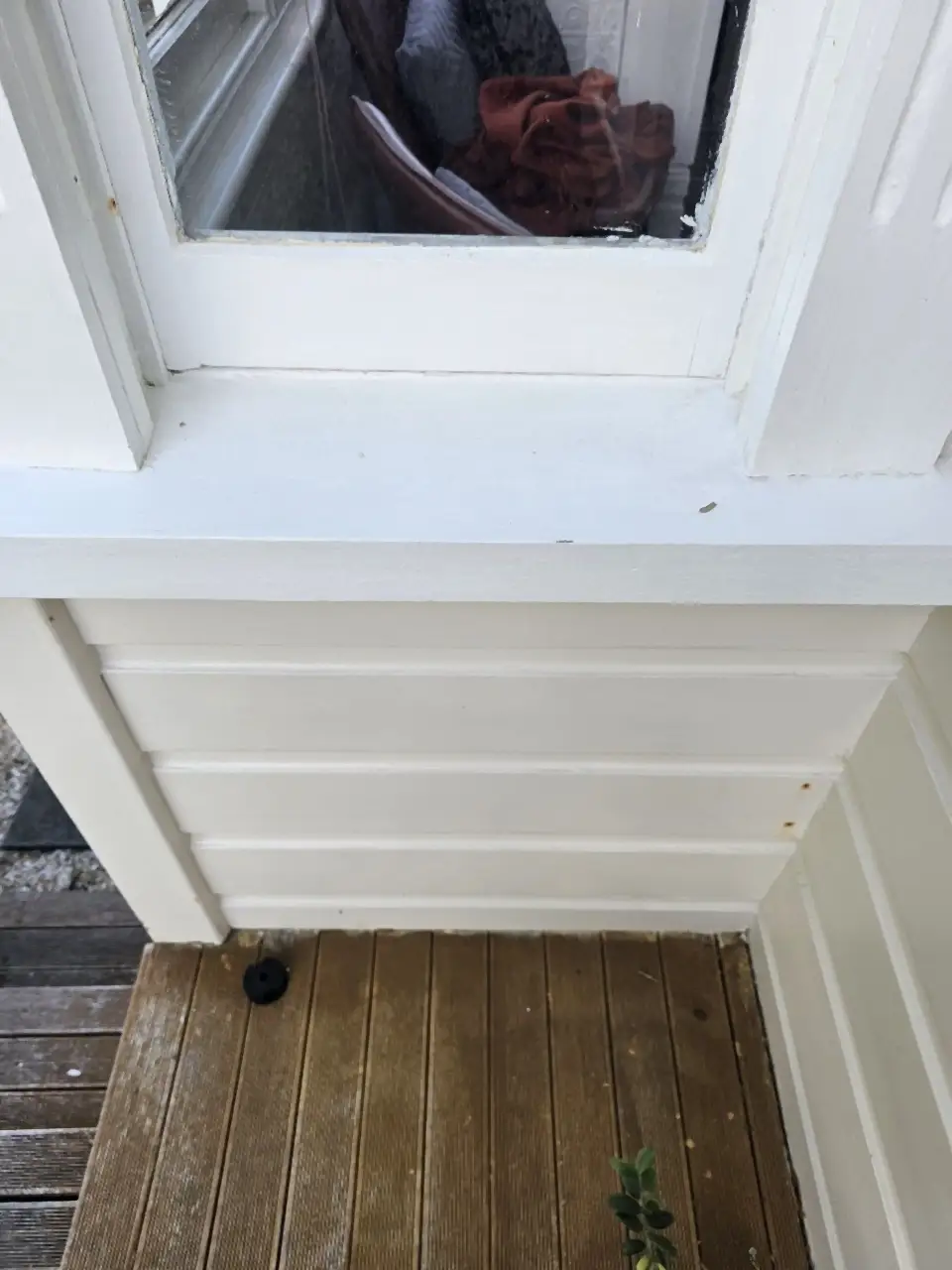 After: The same sill and boards clean and white